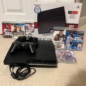 PS3 with 2 controllers and 6 games